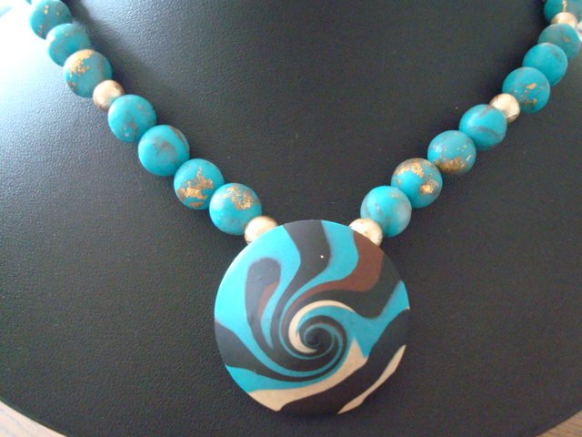 Tuerkis-mit-Blattmetall-goldfarben-und-Swirl